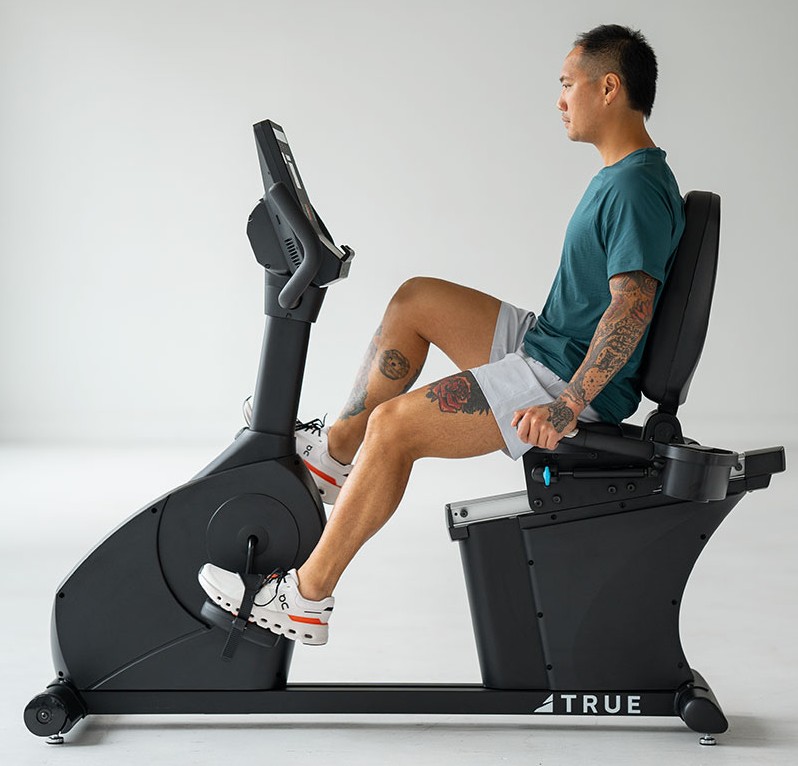 Man using a recumbent exercise bike